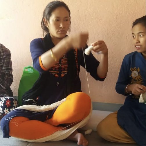 Luna-Leena uil plat knuffeldoekje met geluid - Roze - Biologisch katoen - Handgehaakt in Nepal