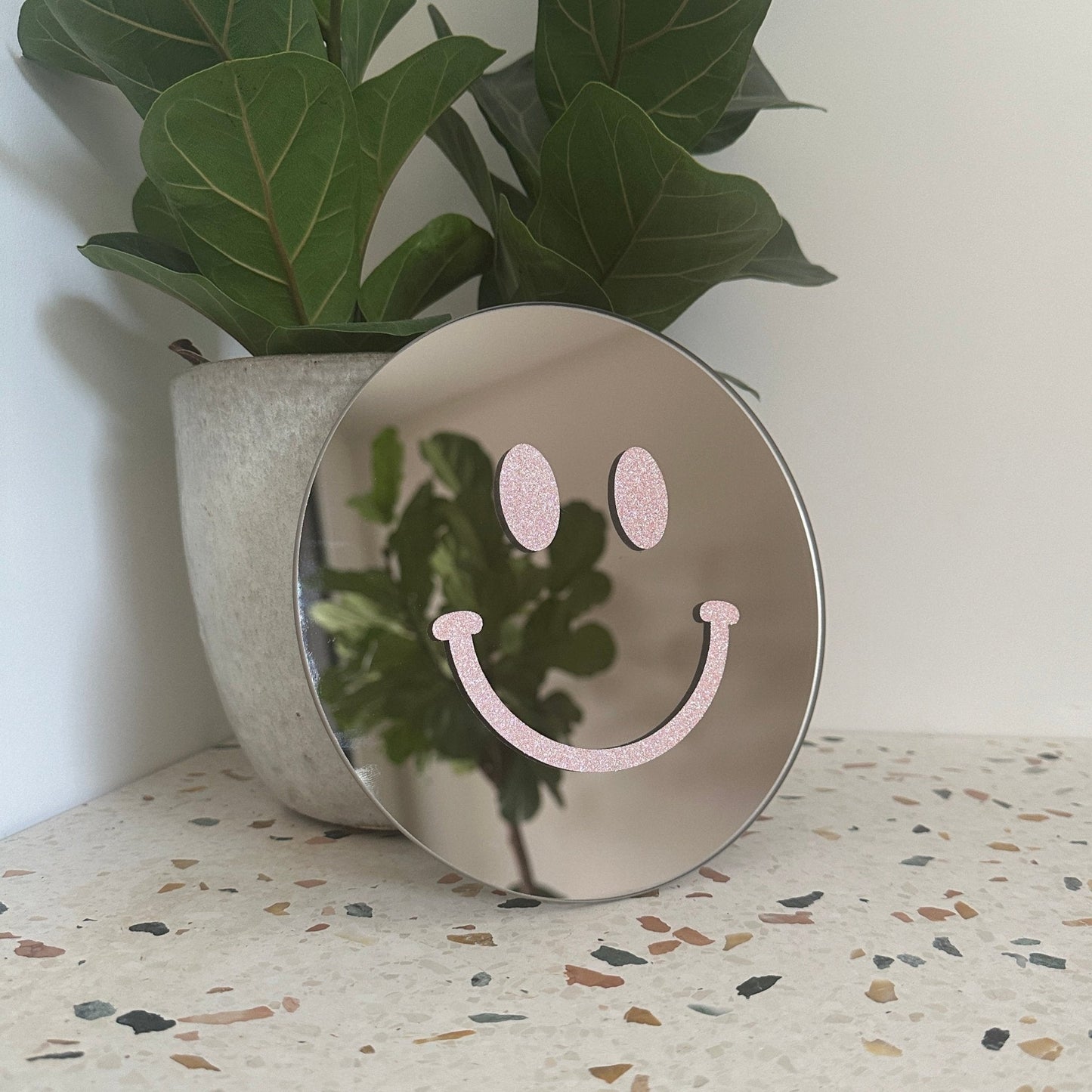 Vrolijkmakende Smiley spiegel.