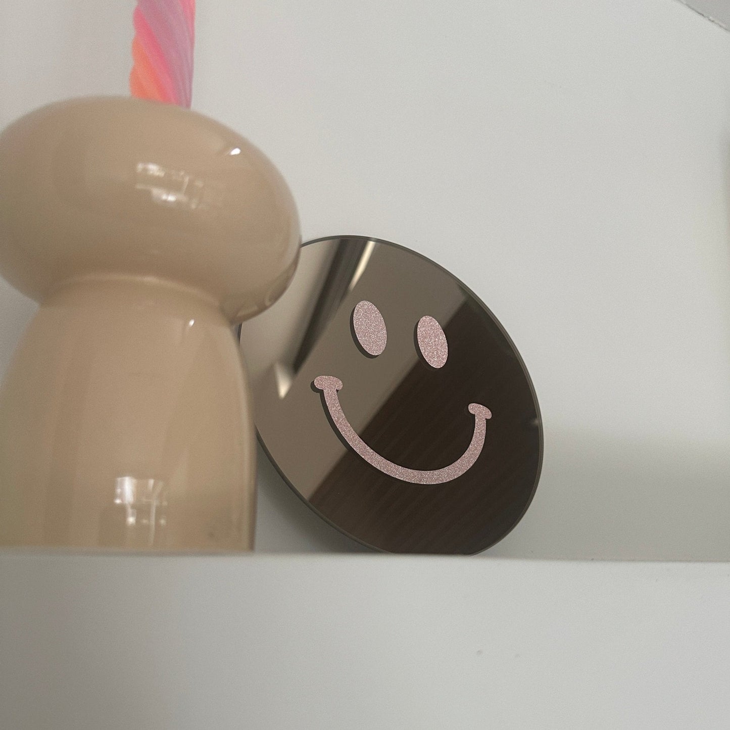 Vrolijkmakende Smiley spiegel.