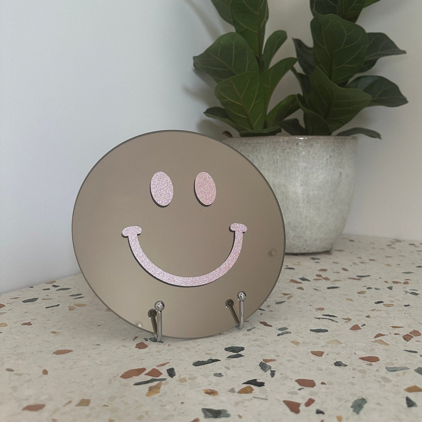 Vrolijkmakende Smiley spiegel.
